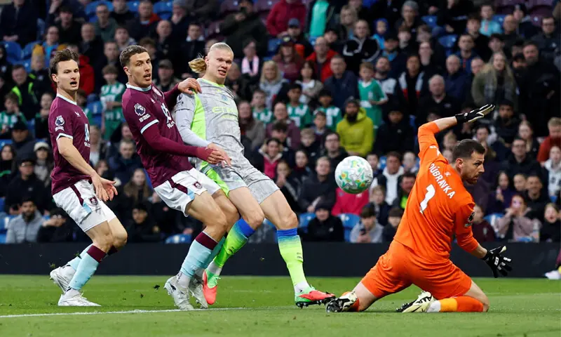 BURNLEY: Manchester City&rsquo;s Erling Haaland (second R) scores past Burnley goalkeeper Martin Dubravka during their Premier League match at Turf Moor.&mdash;Reuters