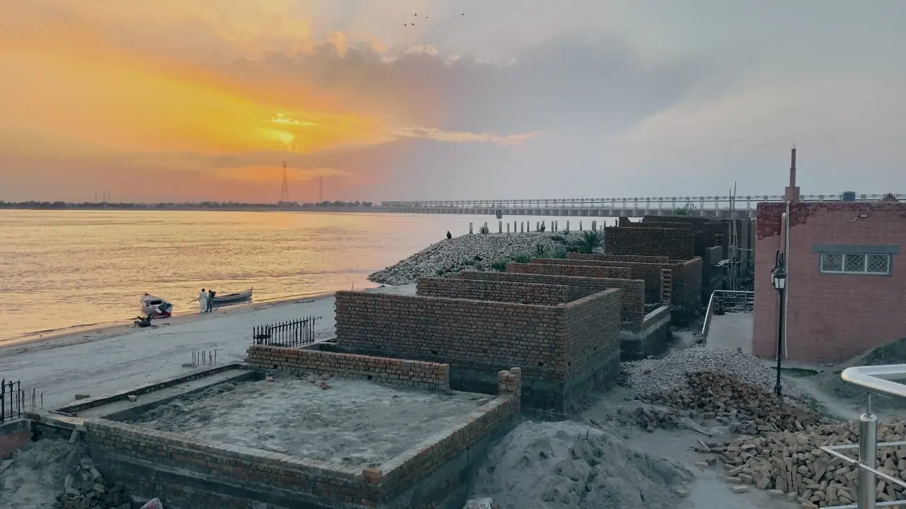 A view of commercial structures under construction along the riverbank &mdash; photo by Khadim Khar Hussain