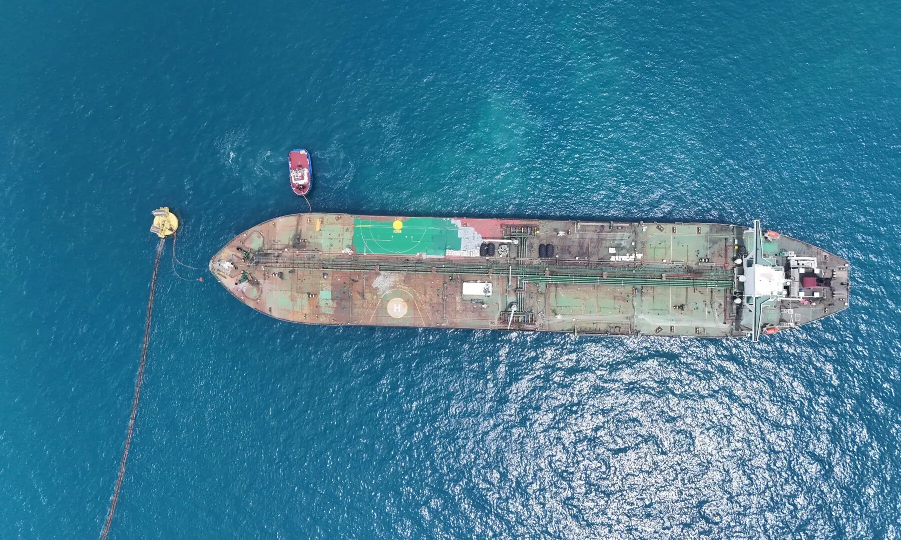An overhead drone view of oil tanker Helga, berthed at one of Iraq&rsquo;s southern offshore oil terminals near Basra on April 24, 2026, as it prepares to load crude oil, becoming the second vessel to arrive since the closure of the Strait of Hormuz. &mdash; Reuters