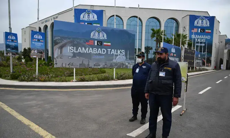 Private security personnel stand at the media centre ahead of US&ndash;Iran peace talks in Islamabad on April 11, 2026. &mdash; AFP