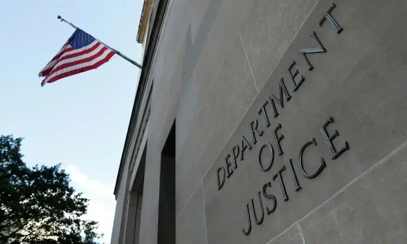 Signage is seen at the United States Department of Justice headquarters in Washington, DC, US, August 29, 2020. &mdash; Reuters/File