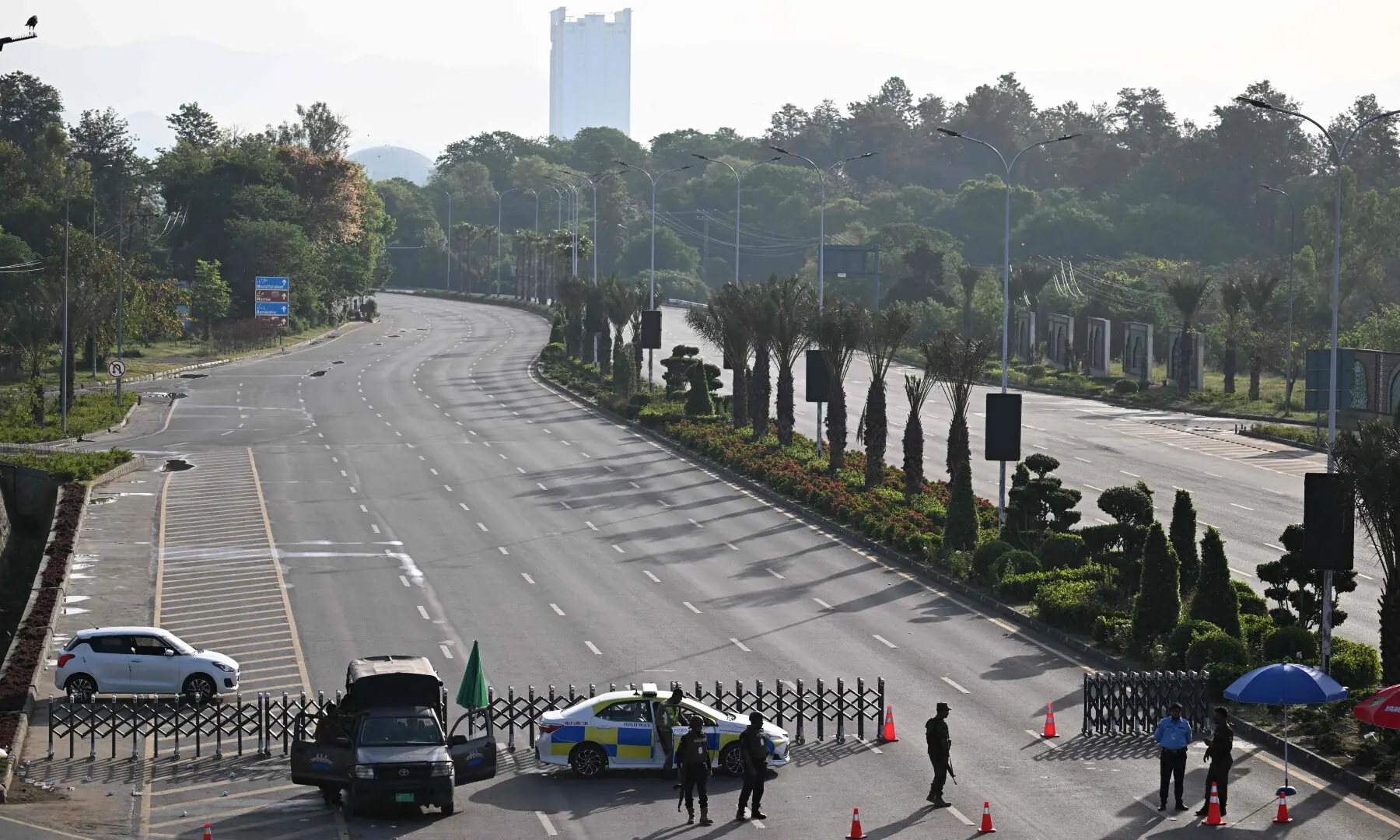 Police officers stand guard at a closed street leading to the Serena Hotel, the venue for expected US-Iran talks, in Islamabad&rsquo;s Red Zone on April 25, 2026. &mdash; AFP