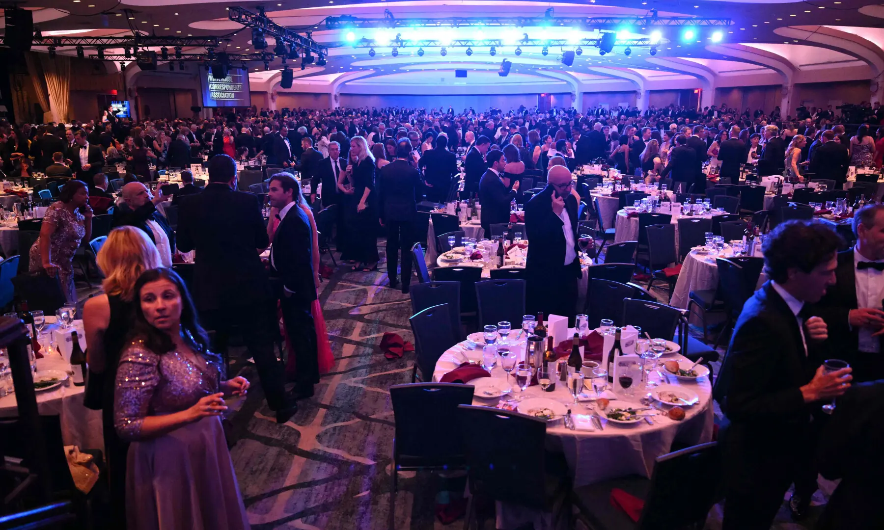 Attendees are seen inside the ballroom after shots were reportedly fired during the White House Correspondents' dinner at the Washington Hilton in Washington, DC, on April 25, 2026. &mdash; AFP