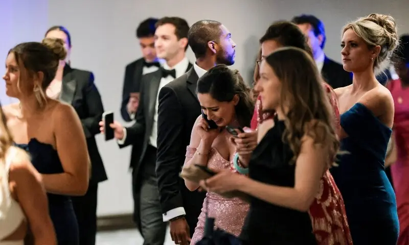 A guest reacts as she makes a phone call following a shooting incident during the annual White House Correspondents Association dinner in Washington, DC, US on April 25. &mdash; Reuters