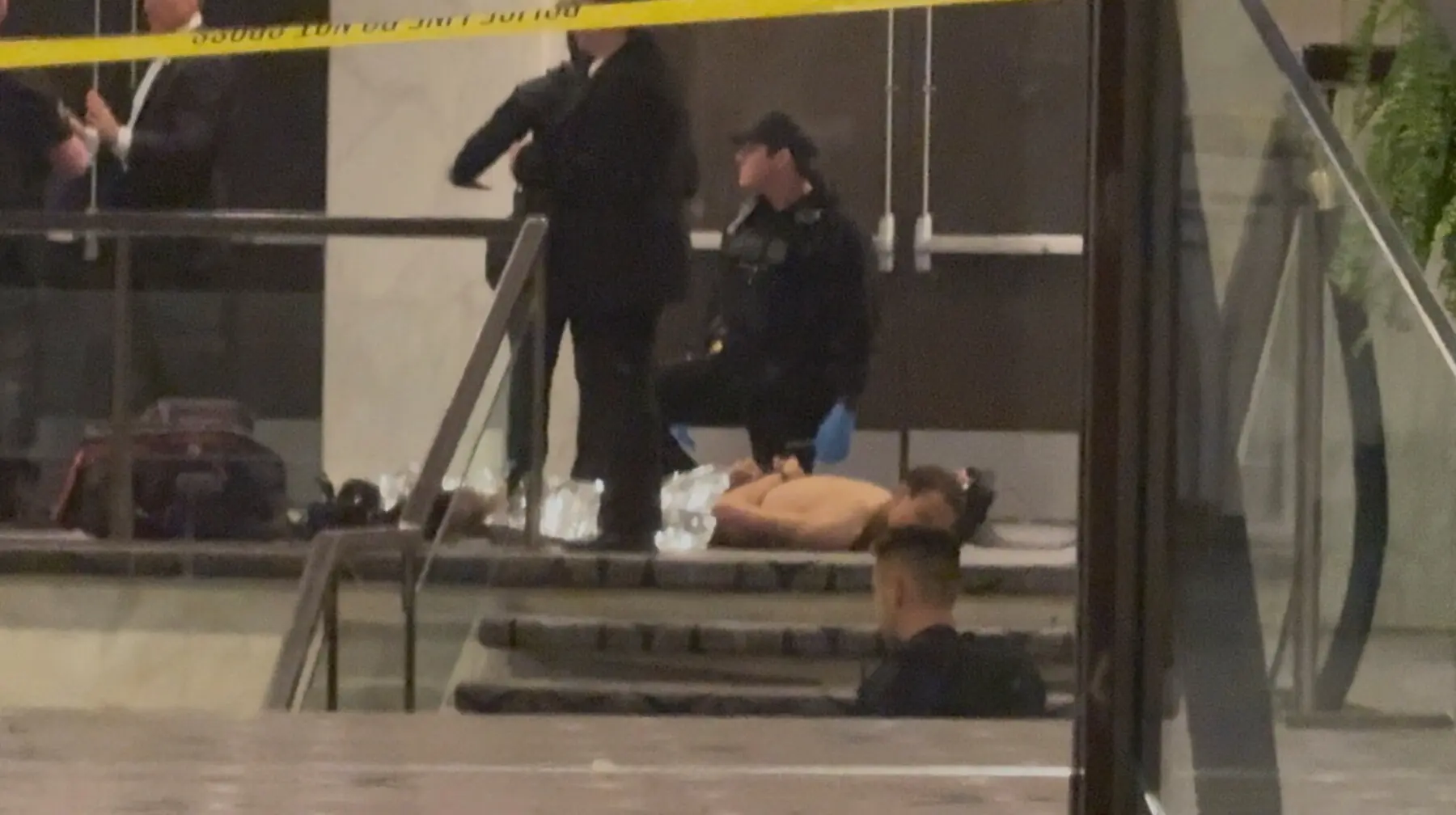 Cole Tomas Allen, a suspect in the shooting incident at the White House Correspondents&rsquo; Association dinner, lies on the floor after being detained by law enforcement personnel, in Washington, DC, US, April 25, 2026, in this screengrab from a video. &mdash; Reuters
