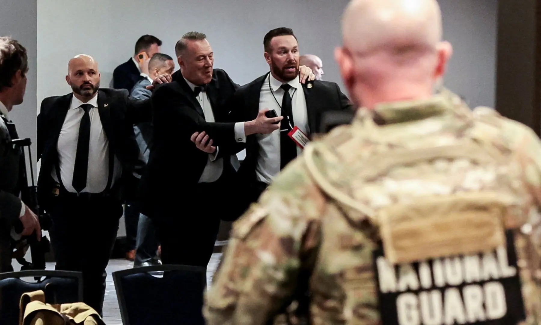 Security officials evacuate guests as a shooter opens fire during the annual White House Correspondents&rsquo; Association dinner in Washington, DC, US, April 25. &mdash; Reuters