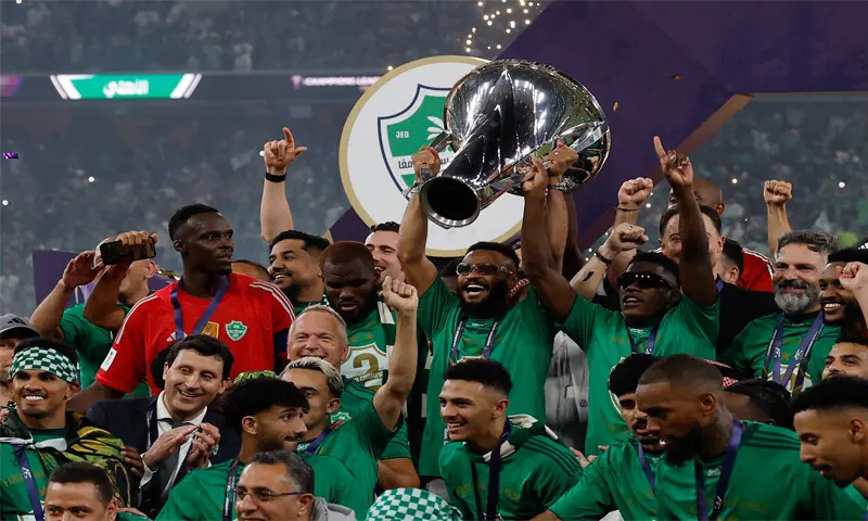 AL AHLI players celebrate with the Asian Champions League trophy after defeating Machida Zelvia in the final at the King Abdullah Sports City Stadium.&mdash;Reuters