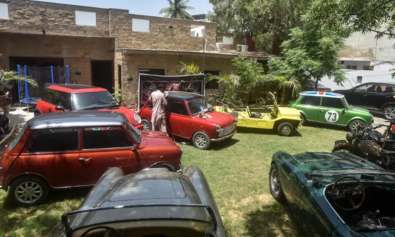 The Austin Mini cars getting last minute finishing touches before leaving for Karachi to Nathiagali rally. &mdash;Fahim Siddiqi / White Star