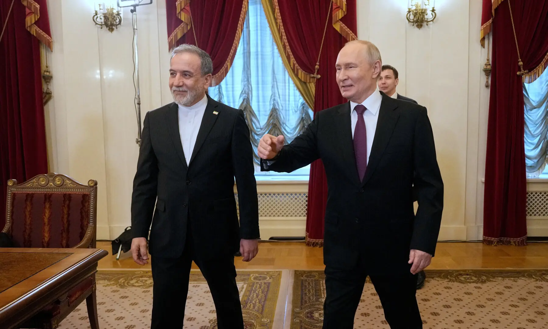 Russian President Vladimir Putin and Iranian Foreign Minister Abbas Araqchi attend a meeting at the Boris Yeltsin Presidential Library in Saint Petersburg, Russia on April 27, 2026. &mdash; Reuters