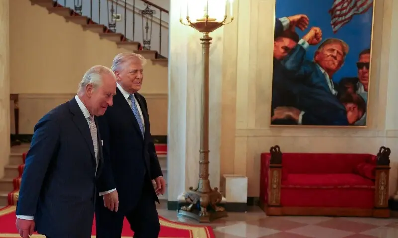 US President Donald Trump and Britain&rsquo;s King Charles walk on the day they meet for tea at the White House in Washington, DC, US, April 27, 2026. &mdash;AFP