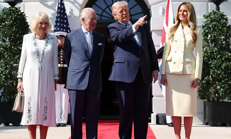 US President Donald Trump and First Lady Melania Trump greet Britain's King Charles III and Britain's Queen Camilla upon arrival at the South Portico of the White House in Washington, DC, on April 27, 2026. &mdash;AFP