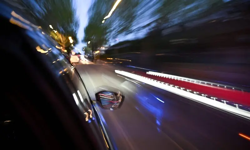 An image taken from the window of a Metropolitan Police interceptor vehicle travelling at speed towards the scene of a mobile phone theft in central London April 25. &mdash; AFP