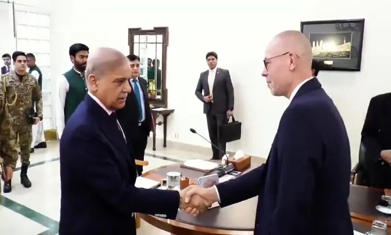 PM Shehbaz Sharif shakes hands with EU delegation head Peteris Ustubs.&mdash;X/PakPMO