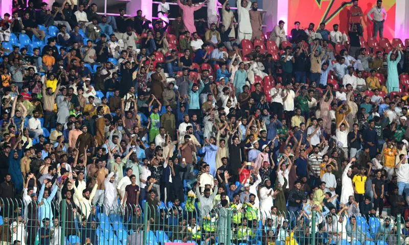 FANS rejoice during the Pakistan Super League match between Peshawar Zalmi and Islamabad United at the National Bank Stadium on Tuesday. &mdash;White Star