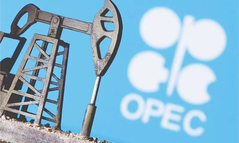 An illustration of a model oil pump jack in front of the Opec logo. &mdash; Reuters/File
