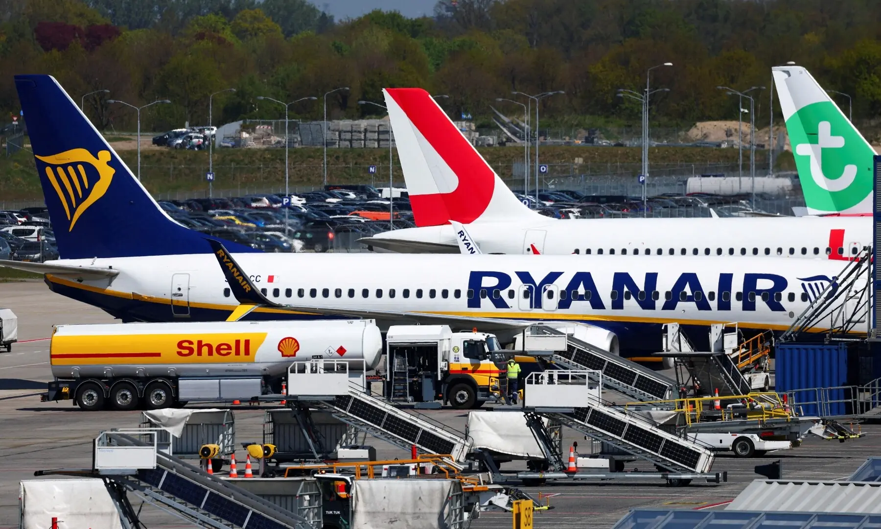 A Shell tanker truck refuels a Ryanair aircraft at Eindhoven Airport, Netherlands on April 24, 2026. &mdash; Reuters