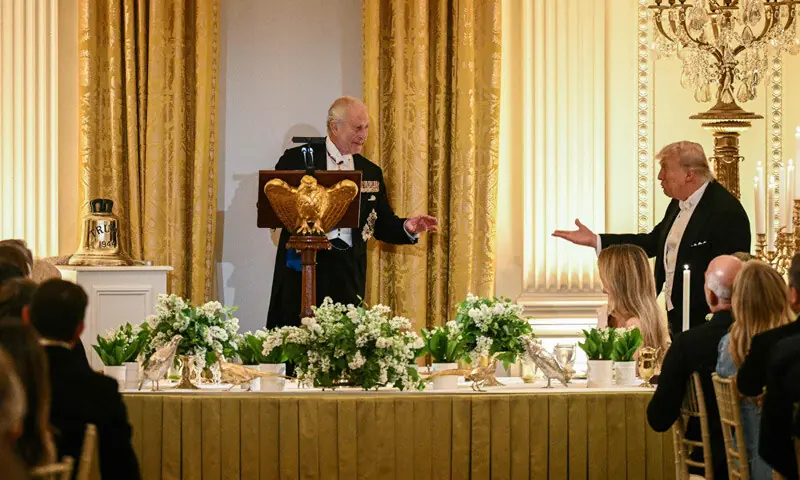 Britain&rsquo;s King Charles III presents the original bell from the HMS Trump, a World War II-era submarine, as a gift to US President Donald Trump during a State Dinner at the White House.&mdash;AFP