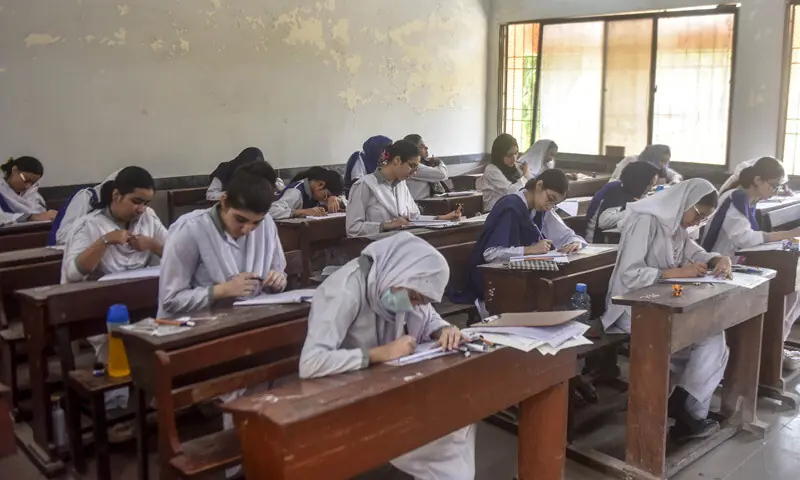 Students take their first paper at the Sir Syed Government Girls College on Wednesday.&mdash;Fahim Siddiqi / White Star