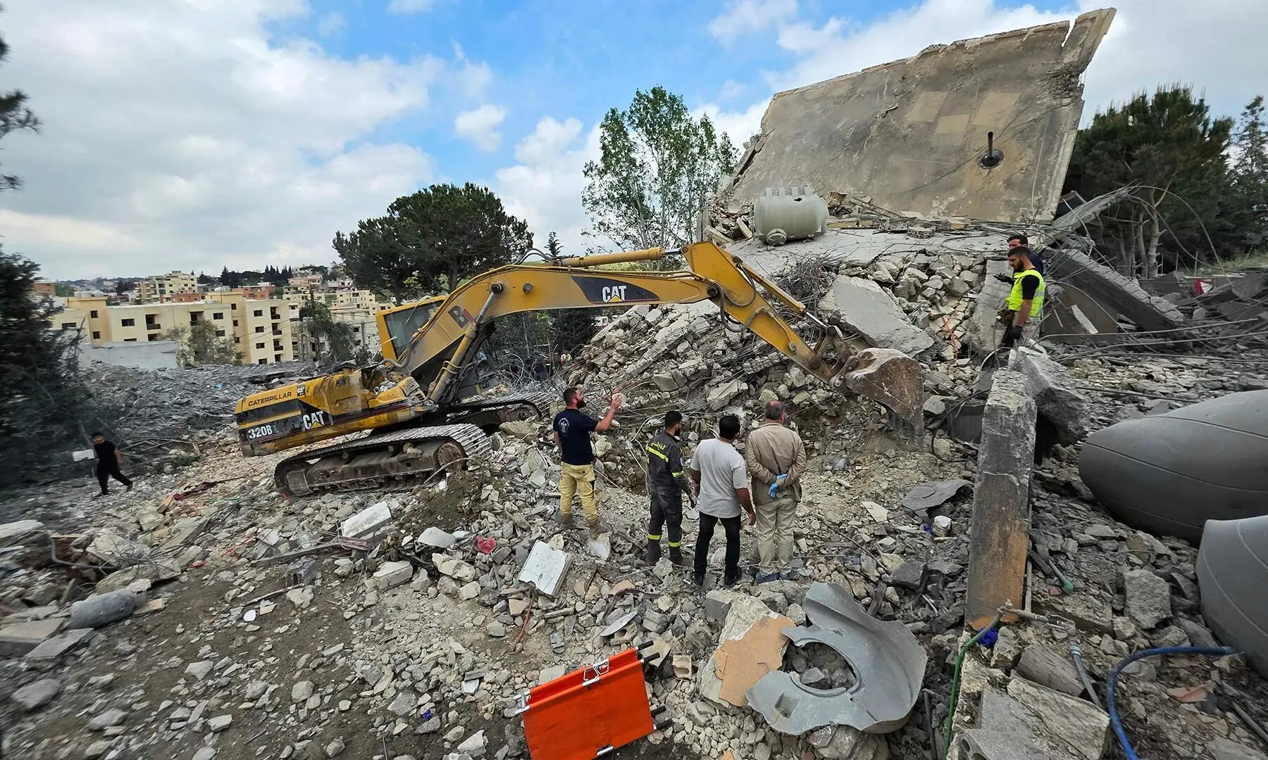 Lebanese first responders search for human remains amongst the rubble the day after a house was targeted in an Israeli airstrike in the southern Lebanese city of Nabatieh, on May 1, 2026. &mdash; AFP