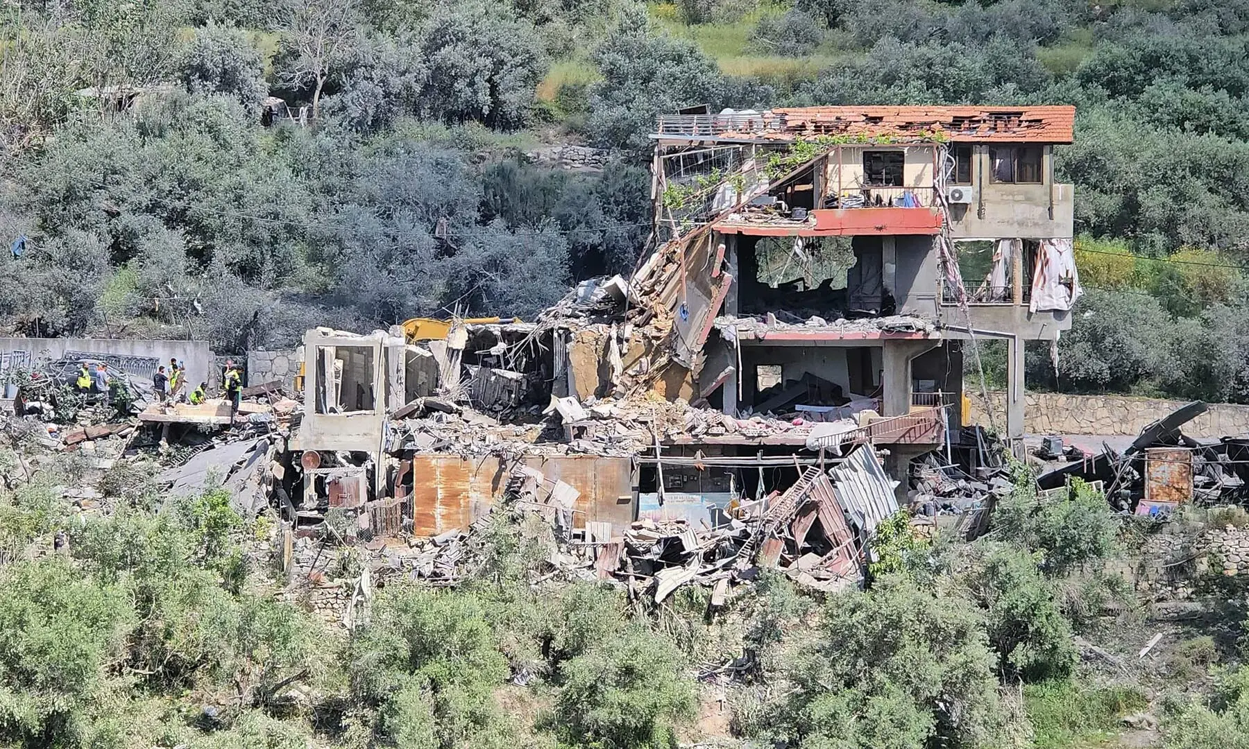 First responders search for survivors amongst the rubble at the site of an Israeli airstrike that targeted the southern Lebanese village of Ain Baal on May 1, 2026. &mdash; AFP
