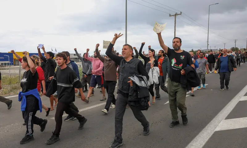 ACTIVISTS from the Global Sumud Flotilla, which was intercepted on international waters by the Israeli Navy, shout slogans as they walk towards the airport of Heraklion, on the island of Crete.&mdash;Reuters