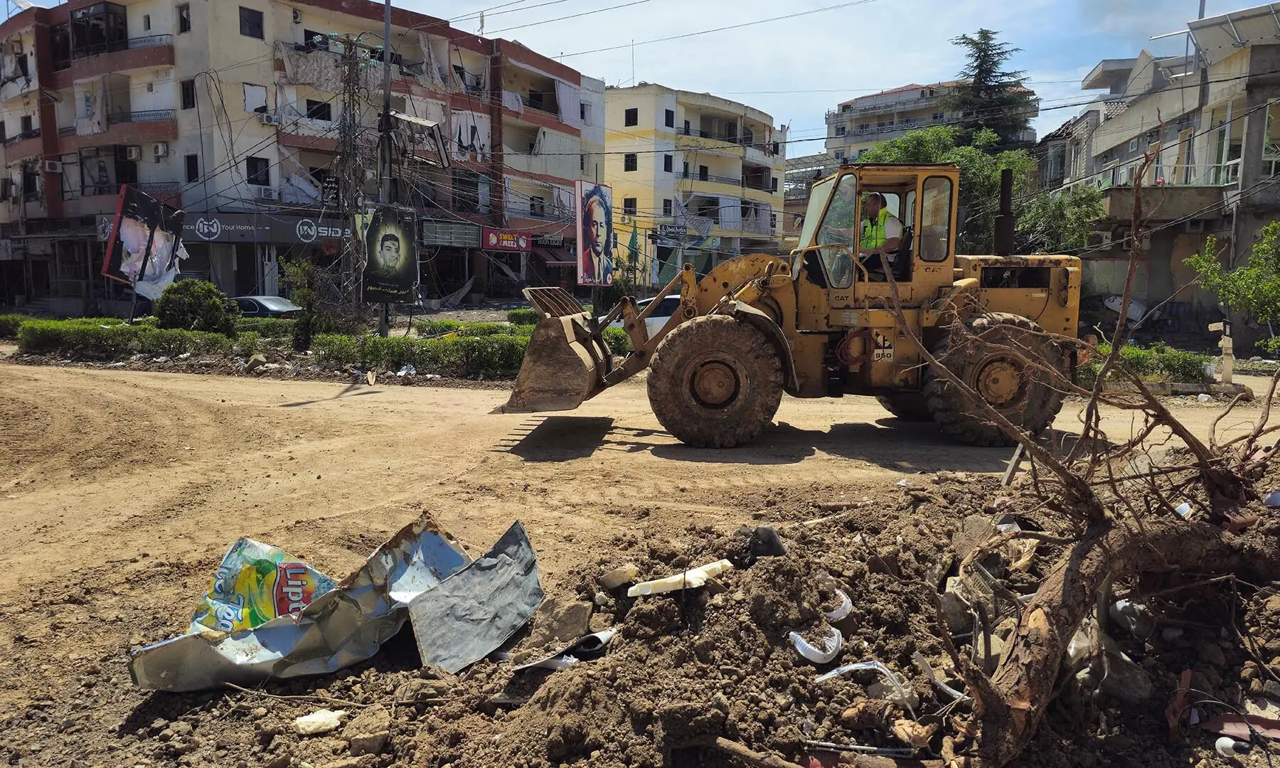 A bulldozer clears rubble from a destroyed building following Israeli strikes in the town of Habboush, in southern Lebanon&rsquo;s Nabatieh Governorate on May 2, 2026. &mdash; Reuters