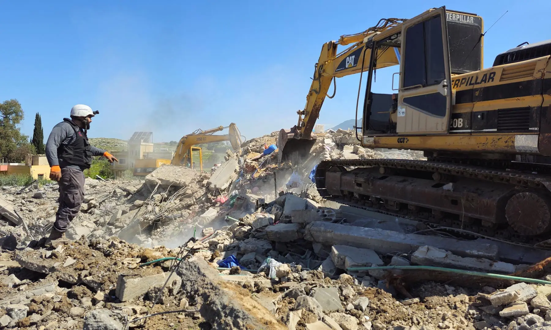 Rescue personnel clear rubble from buildings destroyed following Israeli strikes in the town of Habboush, in southern Lebanon&rsquo;s Nabatieh Governorate on May 2, 2026. &mdash; Reuters