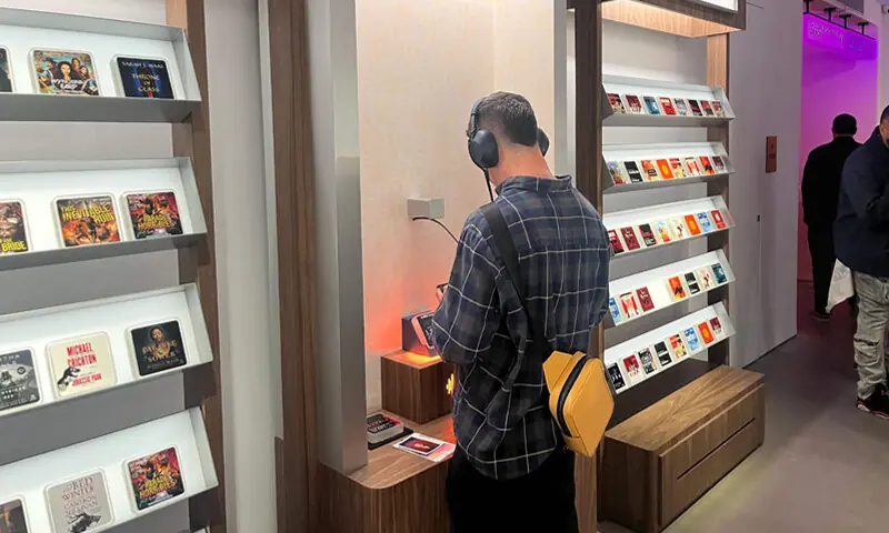 A CUSTOMER shops at the Audible Story House in New York.&mdash;AFP
