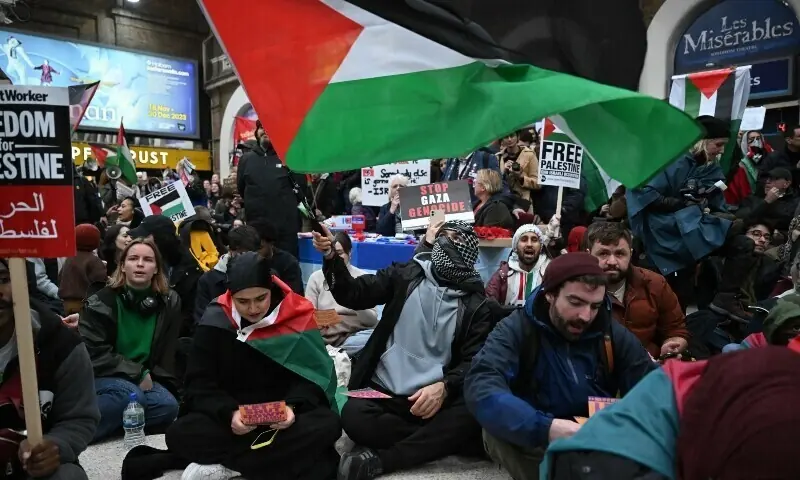 Demonstrators take part in a protest inside Charing Cross station following the 'London Rally For Palestine'. &mdash; AFP/File
