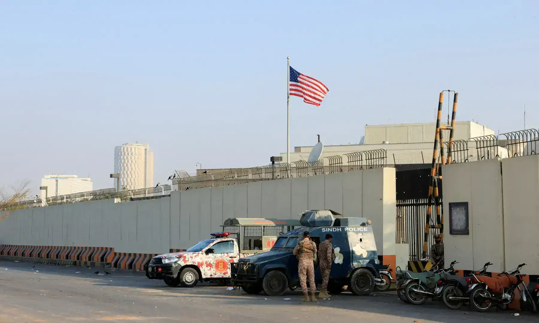 Police and Ranger vehicles stand outside the US Consulate General, a day after a protest, in Karachi on March 2, 2026. &mdash; Reuters/File