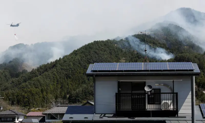 A helicopter conducts firefighting operations, as wildfires continue in Otsuchi, Iwate Prefecture, Japan on April 26, 2026. &mdash; Reuters/File