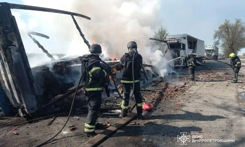 The image taken on May 3, 2026, shows firefighters extinguishing a fire at the site of a drone attack in Dnipropetrovsk region, amid the Russian invasion of Ukraine. &mdash;AFP