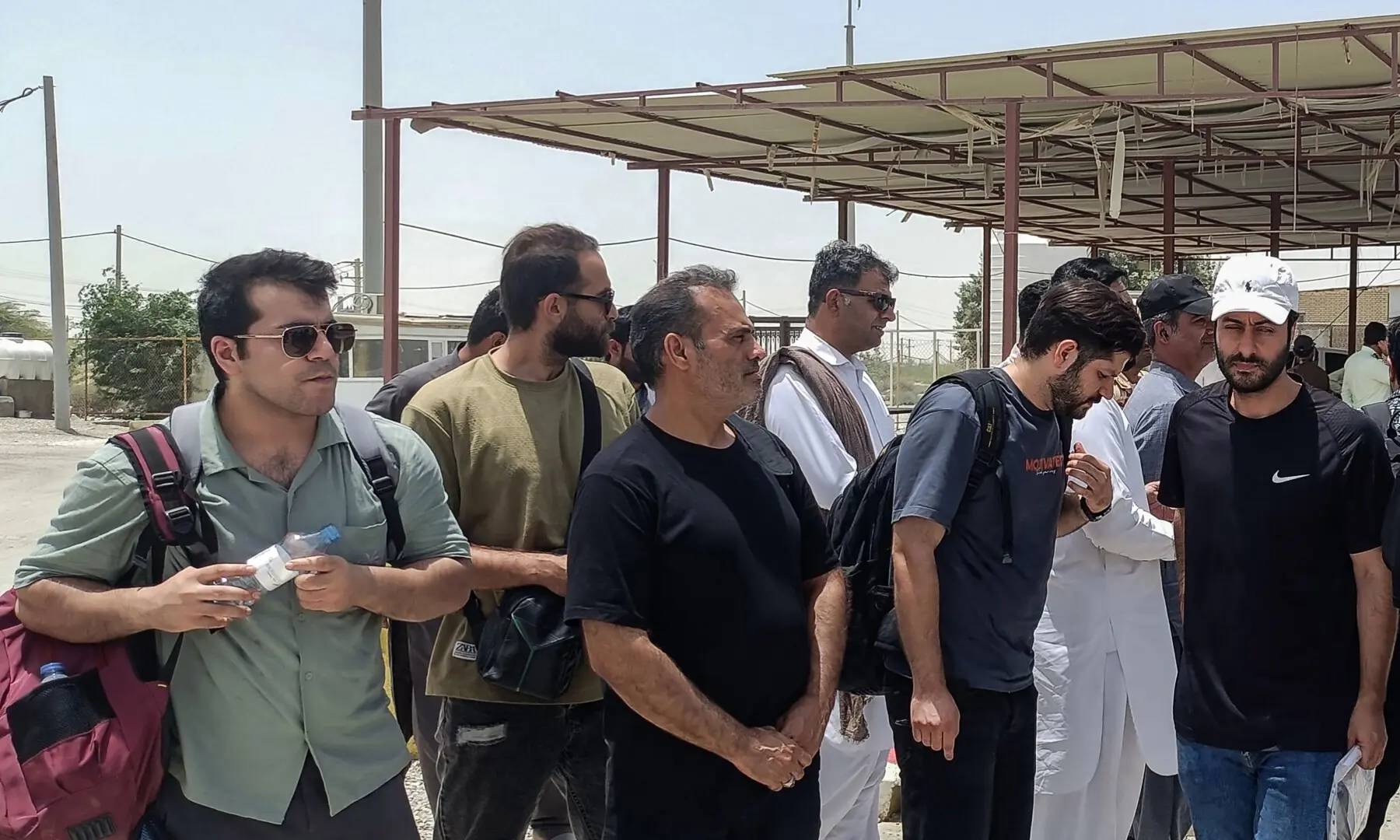 Iranian crew members from a US-seized vessel arrive at Pakistan&rsquo;s Gabd border before they are handed over to Iranian authorities in Gwadar, Balochistan, on May 4, 2026. &mdash; AFP