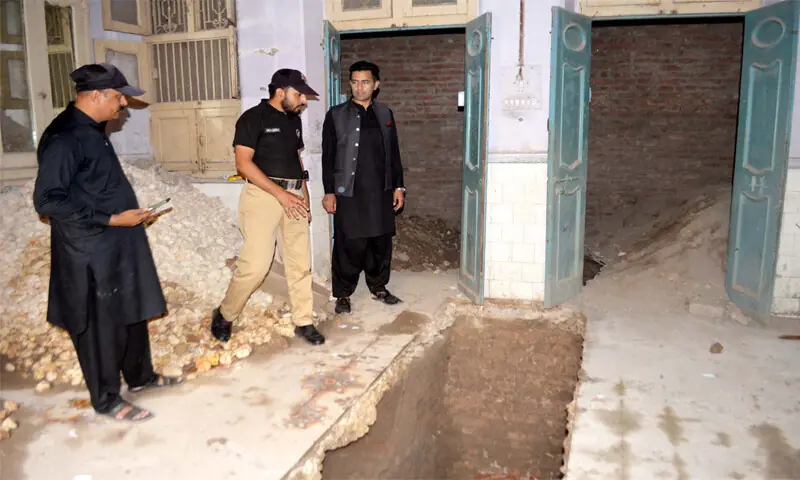 HYDERABAD Assistant Commissioner (City) inspects one of the trenches dug inside the heritage building within the historic Pucca Qila.&mdash;Umair Ali