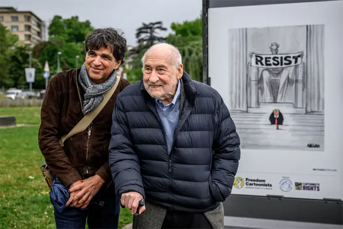 NOBEL&ndash;winning economist Joseph Stiglitz (right) and Swiss cartoonist Patrick Chappatte visit an exhibition, &lsquo;Drawings for Freedom&rsquo;, held to mark World Press Freedom Day on the shores of Lake Geneva.&mdash;AFP