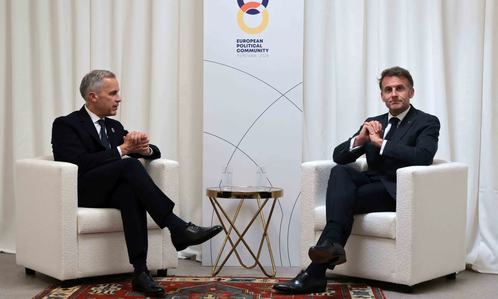France's President Emmanuel Macron and Canada's Prime Minister Mark Carney hold a meeting on the sidelines of the 8th European Political Community (EPC) summit in Yerevan on May 4, 2026. &mdash; AFP