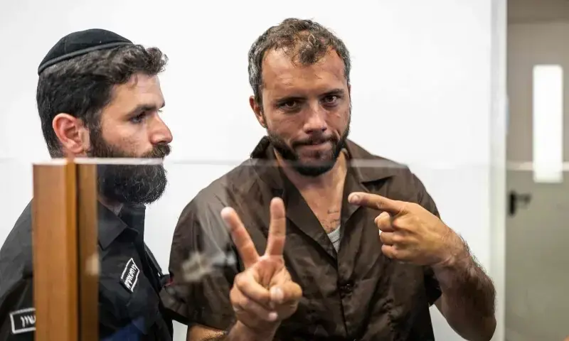 Brazilian activist Thiago Avila gestures upon his arrival at a court in Ashkelon on May 3. &mdash; AFP