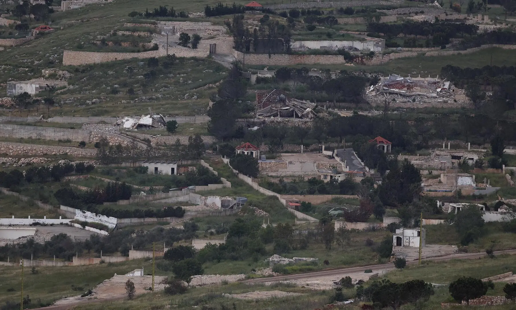 Buildings lie in ruin in southern Lebanon, as seen from the Israeli side of the Israel-Lebanon border, on May 5, 2026. &mdash; Reuters