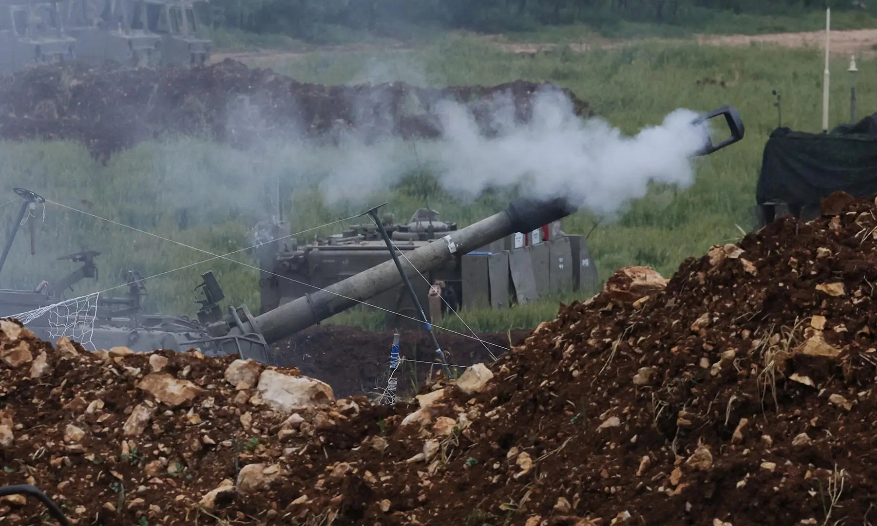 A mobile artillery unit fires, near the Israel-Lebanon border, in Israel on May 5, 2026. &mdash; Reuters