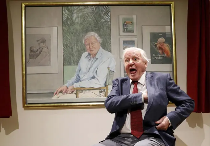 David Attenborough unveils a portrait of himself at a museum where he used to volunteer as a teenager.&mdash;Reuters/file