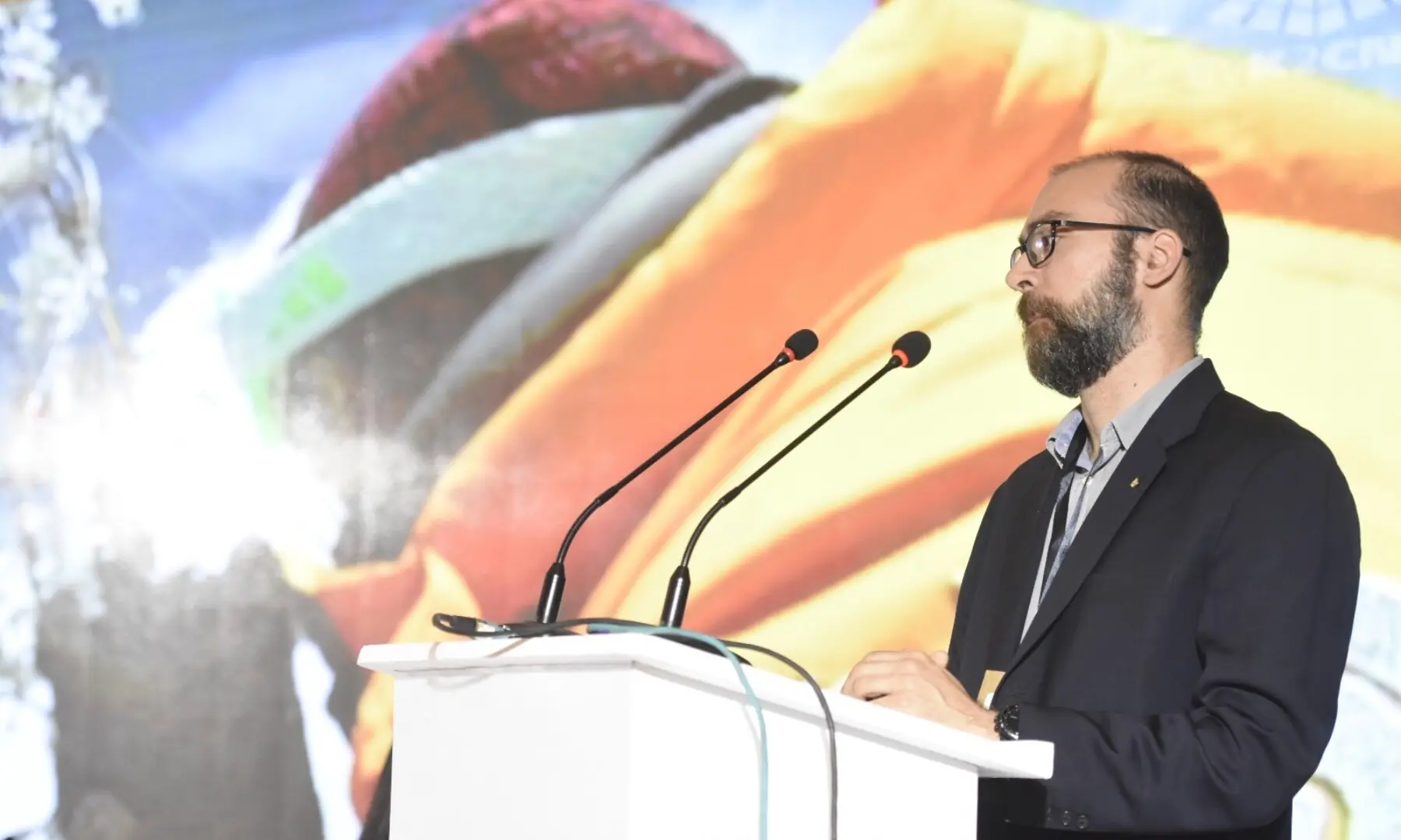  Glaciologist Dr Davide Fugazza speaks at the Breathe Pakistan conference. &mdash; White Star/ Tanveer Shahzad 