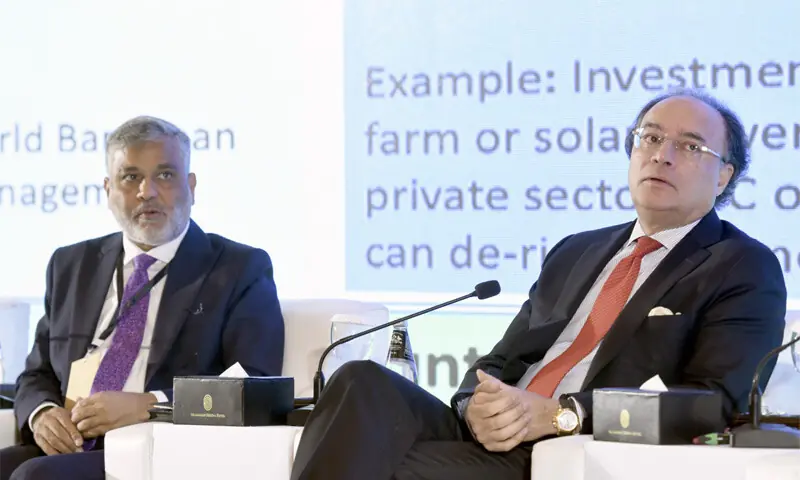 Finance Minister Muhammad Aurangzeb and SBP Deputy Governor Saleemullah listen to a speaker at the Breathe Pakistan conference.&mdash;Tanveer Shahzad