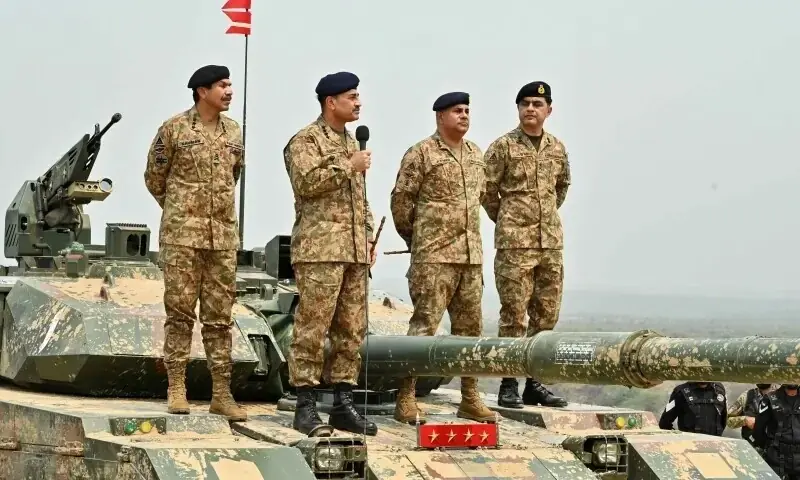 Chief of Defence Forces and Chief of Army Staff Field Marshal Asim Munir holds a microphone during his visit at the Tilla Field Firing Ranges to witness the Exercise Hammer Strike, a high-intensity field training exercise conducted by the Pakistan Army&rsquo;s Mangla Strike Corps, in Mangla on May 1, 2025. &mdash; Reuters/File