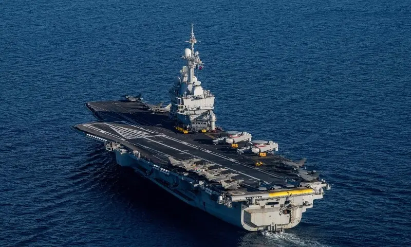 This photograph taken on April 27, 2026, shows an aerial view of the French aircraft carrier Charles de Gaulle at the end of the NATO military exercise Neptune Strike 26-2, off the coast of the Greek island of Crete. &mdash;AFP