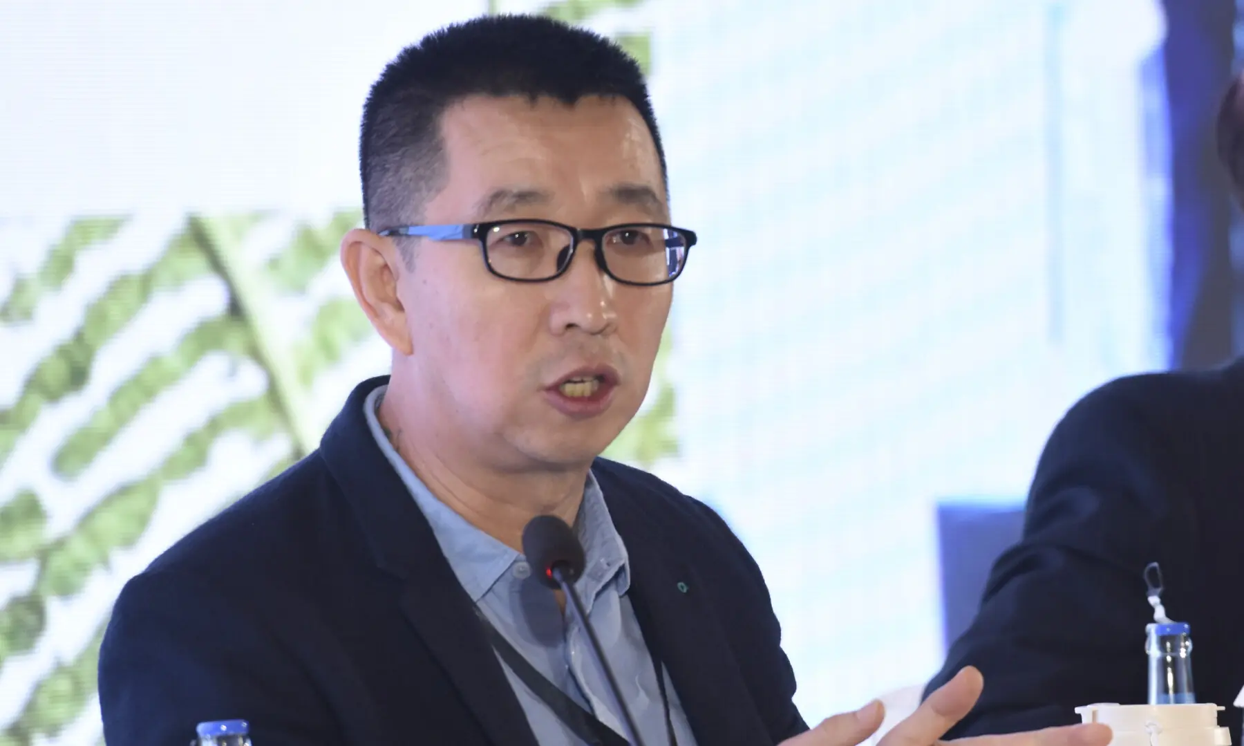 People of Asia for Climate Solutions Founder Tom Xiaojun Wang speaks at Breathe Pakistan. &mdash; White Star/ Tanveer Shahzad