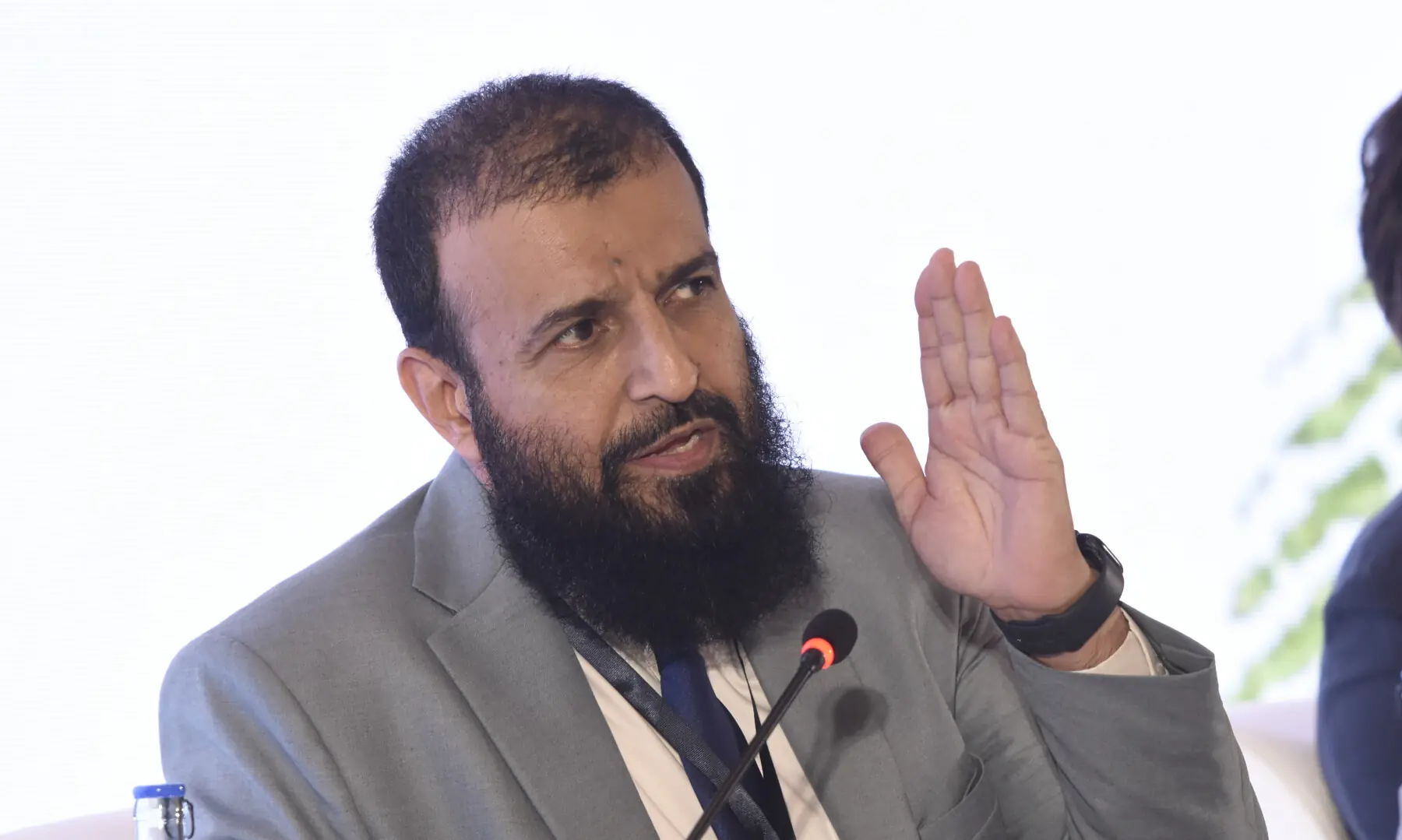  Muhammad Raza, general services head at Meezan Bank, speaks at Breathe Pakistan conference. &mdash; White Star/ Tanveer Shahzad 