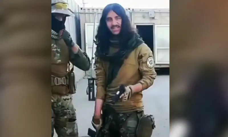 Slain terrorist Fatehullah alias Mudasssir can be seen holding arms. &mdash; Screengrab from a video provided by the author.