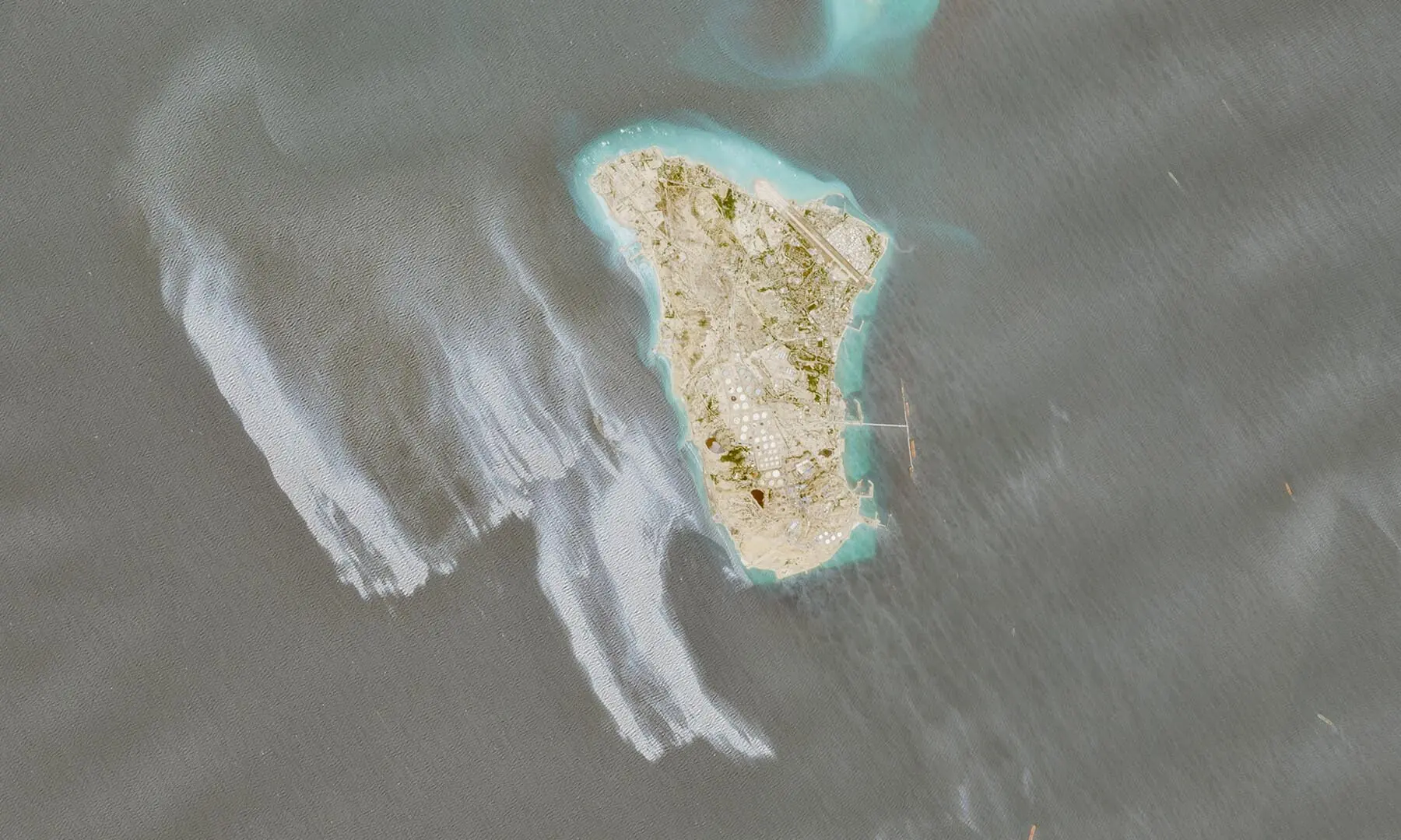 A satellite image shows likely oil spill covering dozens of square kilometers near Iran&rsquo;s Kharg Island on May 6, 2026.  &mdash; Reuters