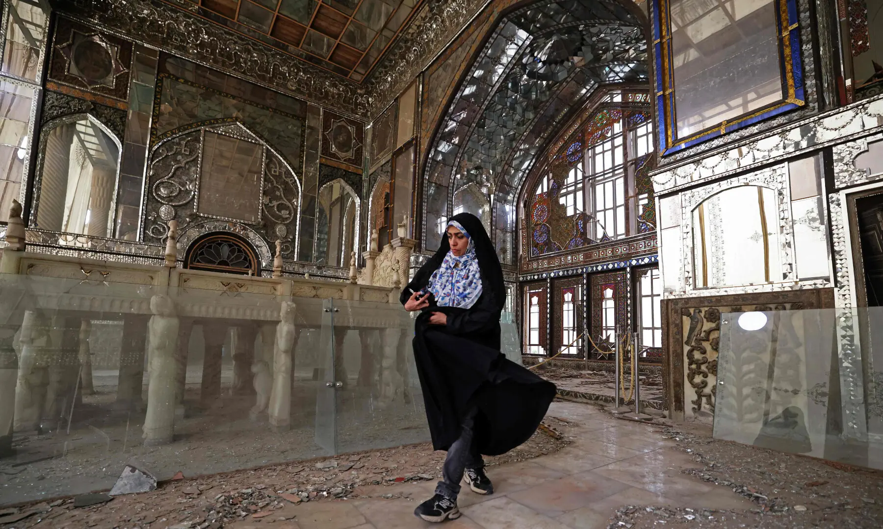 A visitor walks through the damaged interiors of the historic Golestan Palace in Tehran on April 4, 2026. &mdash; AFP/File