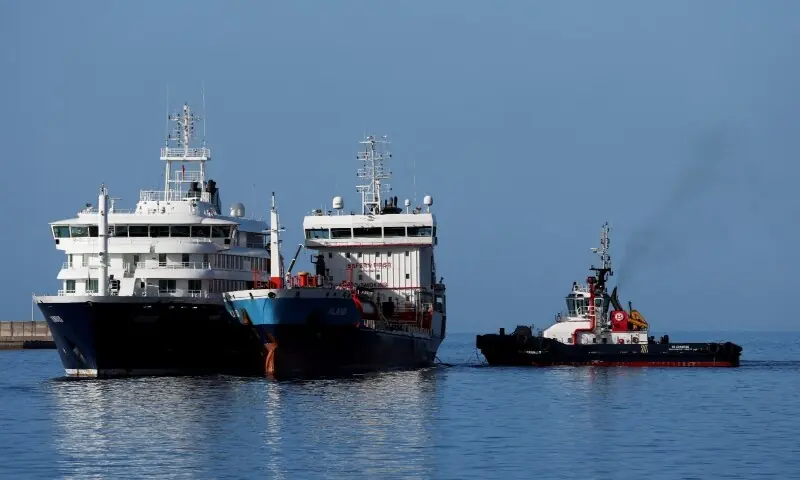 A tanker floats next to the cruise ship MV Hondius, affected by a hantavirus outbreak, at the port of Granadilla de Abona, in Tenerife, Spain, May 11, 2026. &mdash; Reuters